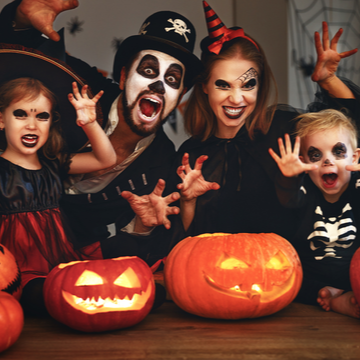 a family in halloween costumes