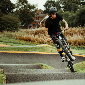 Luke cryer cycling on a pump track